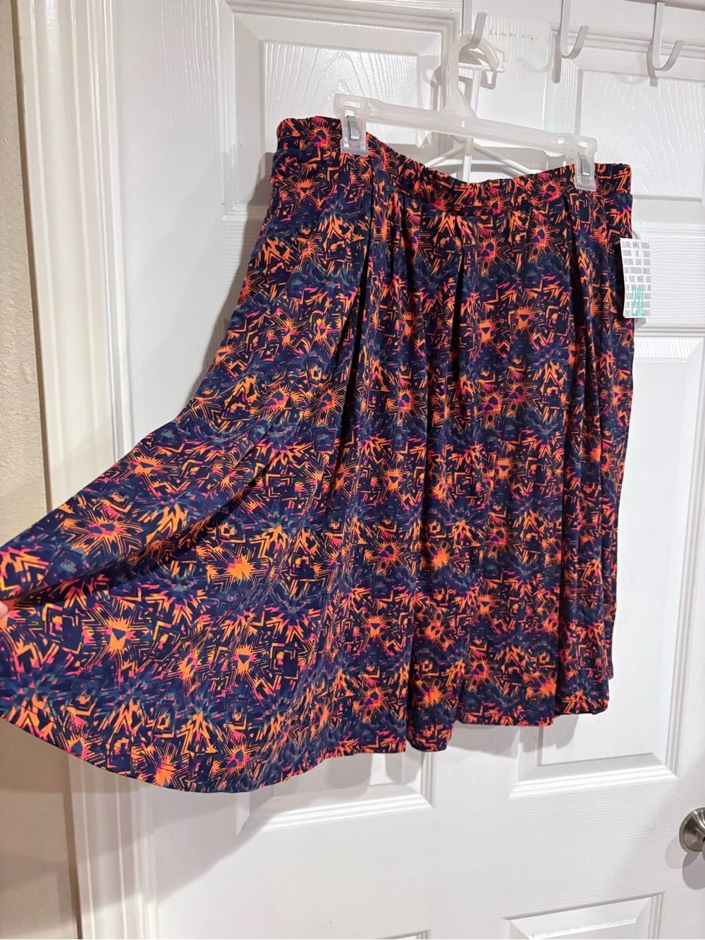 LuLaRoe Navy Skirt with Pink & Orange Burst Print